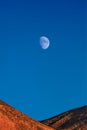 Moon over Herman Cav Canyon. South Gobi, Mongolia. Herman Tsav Canyon. Red Sandstone plateau, Martian landscape.