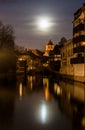 Moon over Ill river in Petite France area of Strasbourg Royalty Free Stock Photo