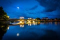 The moon over the John W Weeks Bridge and Charles River at night Royalty Free Stock Photo
