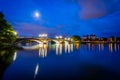 The moon over the John W Weeks Bridge and Charles River at night Royalty Free Stock Photo