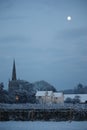 The moon over ladbroke church at dusk Royalty Free Stock Photo