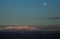 Moon over the mountain peaks