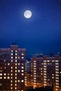 Moon over night city Royalty Free Stock Photo