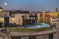 Moon over rooftop pool