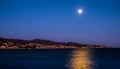 The moon over the sea and Malaga city, Spain Royalty Free Stock Photo