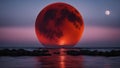 moon over the sea _A red moon over water, representing the passion and the emotion of water. The moon is fiery