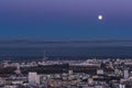 Moon over Warsaw city