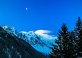 Moon rises above the Mount Blanc in France Royalty Free Stock Photo