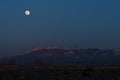Moon rising over La Sal Mountain Moab Utah