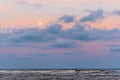 Moon rising during sunset over wild beach in the northeastern coast of Brazil Royalty Free Stock Photo