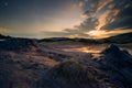 Moon set scene in the night with a starry sky at the muddy volcanoes in Romania Buzau County Royalty Free Stock Photo