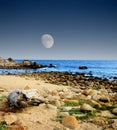 Moon setting Asilomar State Marine Reserve California