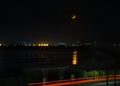 Moon setting over Pegwell Bay in Kent