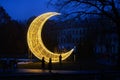 Moon shape lighting installation in the city