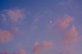 The moon and sunset colors in the sky, in Covington, Kentucky Royalty Free Stock Photo