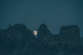 Moon at the top of the mountain. Beautiful night landscape. Wonderful nature. Fantastic mountain peaks and moon. Amazing night lan Royalty Free Stock Photo