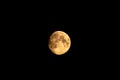 Moon turning red in the dark sky Royalty Free Stock Photo
