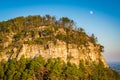 The moon and view of the Big Pinnacle of Pilot Mountain, seen fr Royalty Free Stock Photo