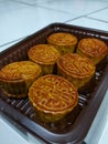 mooncake is a chinese traditional cake served during the mid autumn festival , on 15th day of the 8th month in the lunar calendar