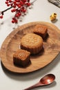 Mooncake on Light Background with Tea. Concept Moon Cake on Mid Autumn Festival or Chinese New year Imlek. Mooncake Popular as