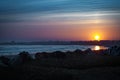 Moonlight over the beach and city on Pacific ocean Royalty Free Stock Photo