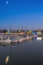 Moonlight over Shoreline Village harbor in Long Beach, California