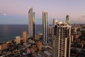 Moonlight over modern coastal city with skyscrapers aerial view Royalty Free Stock Photo