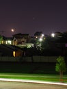 Moon and stars night scene residential area Royalty Free Stock Photo