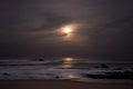 Moonlight reflected on ocean at night. Long exposure. Royalty Free Stock Photo