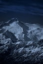 Moonlit high mountain landscape at night