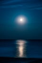 Moonlit night over the sea. Full moon and lunar path Royalty Free Stock Photo