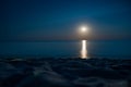 Moonlit path on the night sea. Summer coast. Beautiful landscape. Full moon Royalty Free Stock Photo