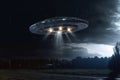 Moonlit sighting, Alien spaceship UFO graces the night sky\'s canvas