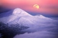 Moonrise among alpine peaks