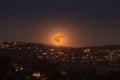 Moonrise of a full moon over the coastline of Laguna Beach Royalty Free Stock Photo