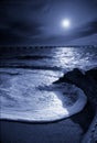 Moonrise Highlights Circular Ocean Wave and Pier in Gulf of Mexico Royalty Free Stock Photo