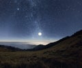 Moonrise in the mountains Royalty Free Stock Photo