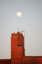 Moonrise Over Building