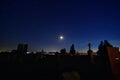 Moonrise over a Wisconsin Cemetery with old grave markers rows in the moonlight Royalty Free Stock Photo