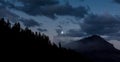 Moonrise at the Rocky mountains in the banff national park canada Royalty Free Stock Photo