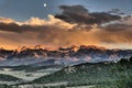 Moonrise and sunset over rocky mountains, Colorado Royalty Free Stock Photo