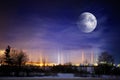 Moons in winter landscape