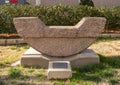 `Moonscape Bench`, a Texas pink granite sculpture by Jesus Bautista Moroles on the University of Oklahoma campus in Norman. Royalty Free Stock Photo