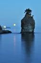 Moonset in the morning at siwash rock Royalty Free Stock Photo