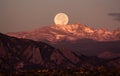 Moonset over the rocky mountains, behind Boulder Colorado Royalty Free Stock Photo