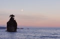 Moonset with siwash rock, stanley park Royalty Free Stock Photo