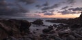 Moonset and sunset at Crescent Bay beach in Laguna Beach