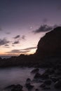 Moonset and sunset at Crescent Bay beach in Laguna Beach Royalty Free Stock Photo