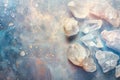 moonstone crystals geode close up on stone background, esoteric blue mineral texture on grey surface Royalty Free Stock Photo