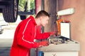 Moor mechanic checking the readout on a computer Royalty Free Stock Photo